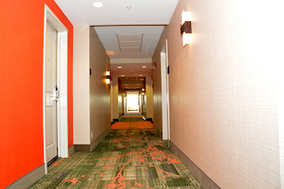 mep hotel building and renovations shows beautiful multi colored wallcoverings in hallway