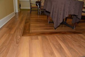 senior home renovation upgraded decorative inlay hardwood flooring