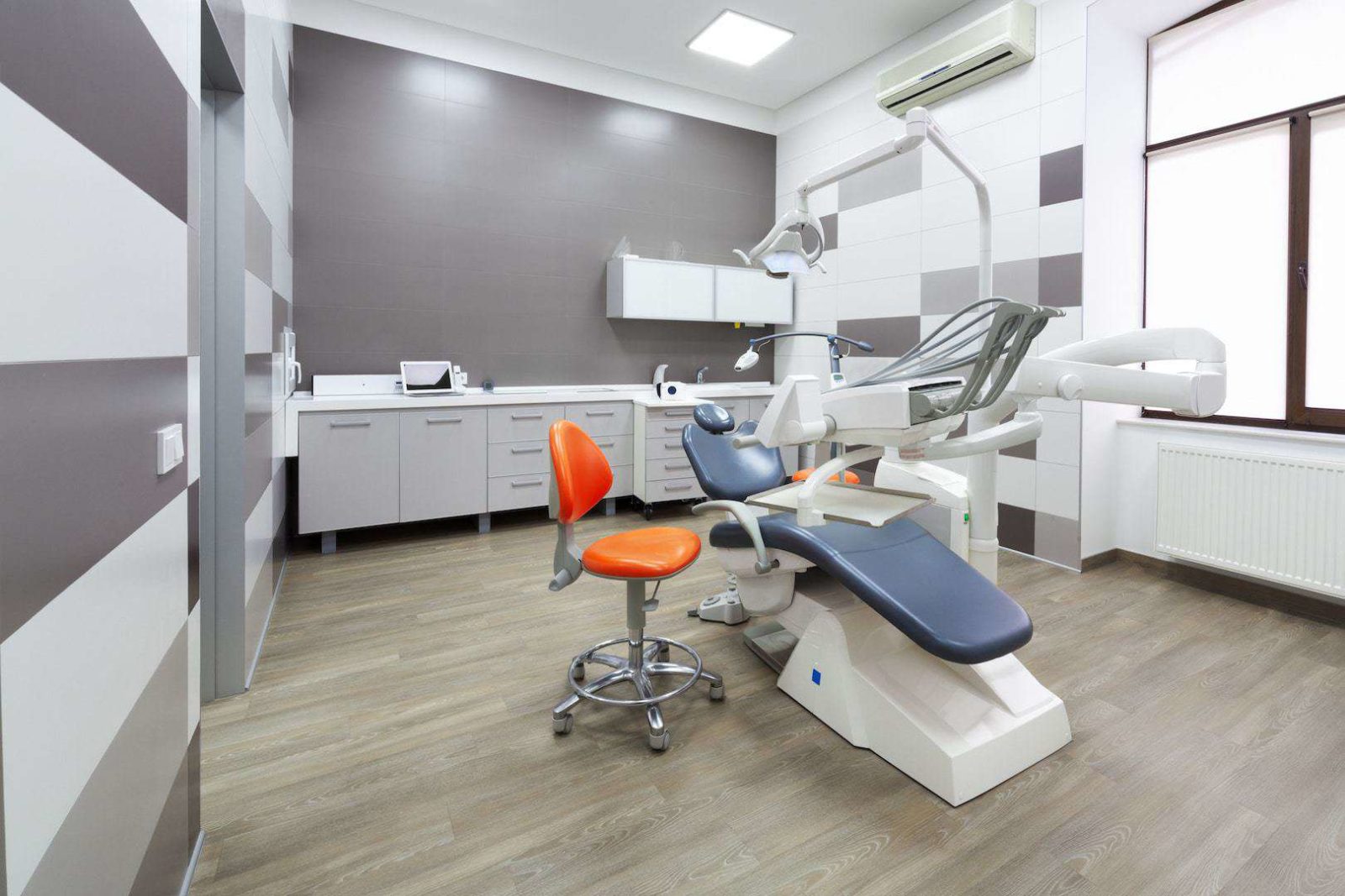 renovating office space includes accent color wall in dental office
