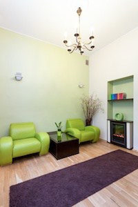 dental office remodeling new waiting area with plants and fireplace